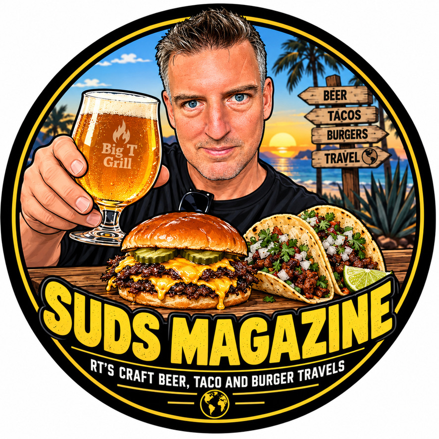 Suds Magazine logo: Rob raising a beer with tacos, a burger and a tropical sunset